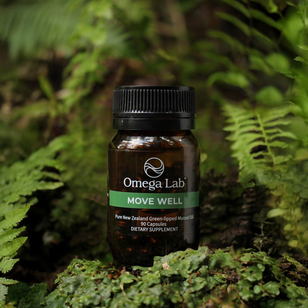 Omega Lab Move Well 90 Capsules bottle among green forest plants